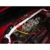 Rozpórka przednia (Front Upper Strut Bar)Ultra Racing Daihatsu Charade G200 1.3 RHD