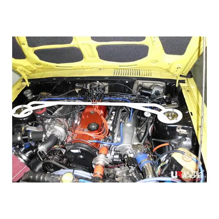 Rozpórka przednia (Front Upper Strut Bar)Ultra Racing Mitsubishi Lancer A174 79-87
